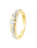 Diamond solitaire ring diamond sided in 18 K gold