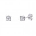 Diamond halo solitaire earrings in 18 K gold