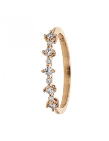 Wedding ring with claw set diamonds in 18 K gold