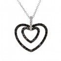 Two hearts pendant with black and white diamonds in 18 K gold
